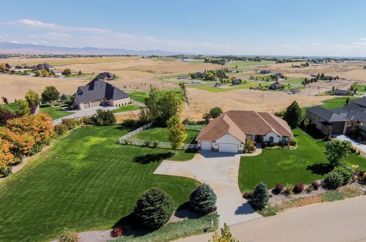 Aerial view of acreage homes and farmland near Star, Idaho