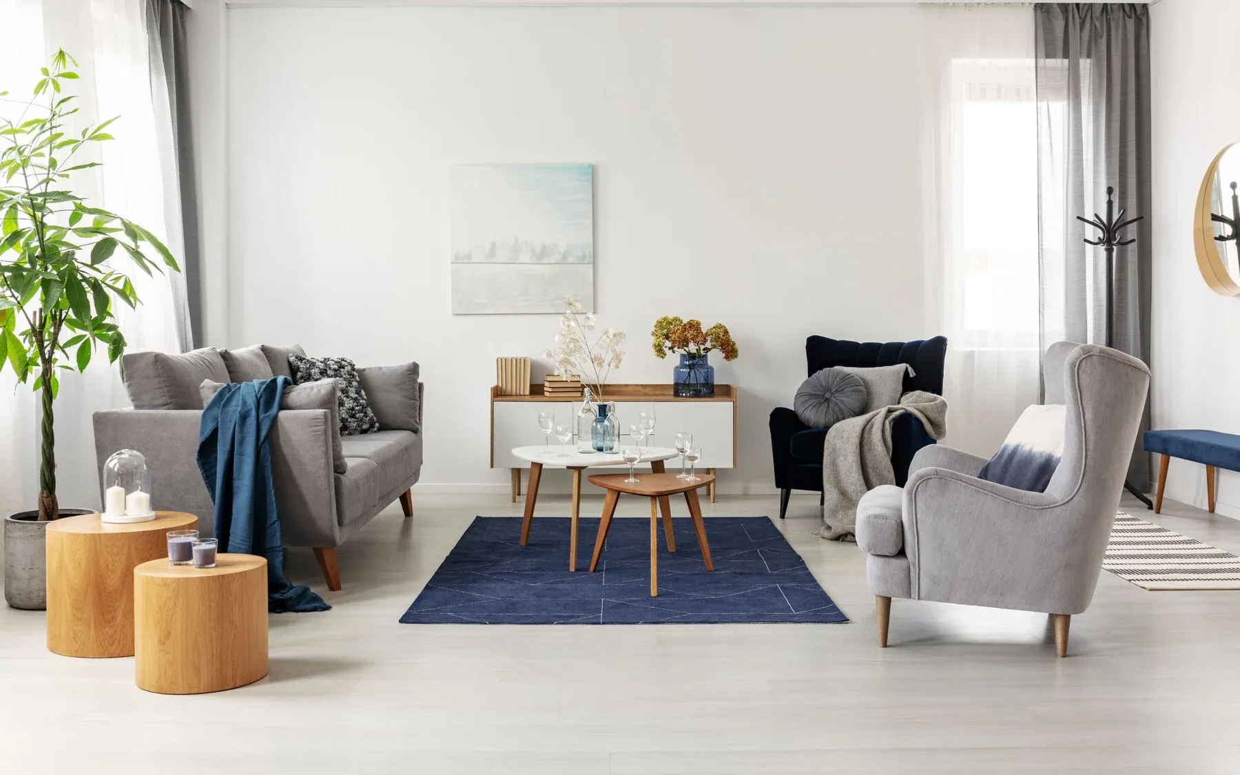 Bright living room with gray sofas